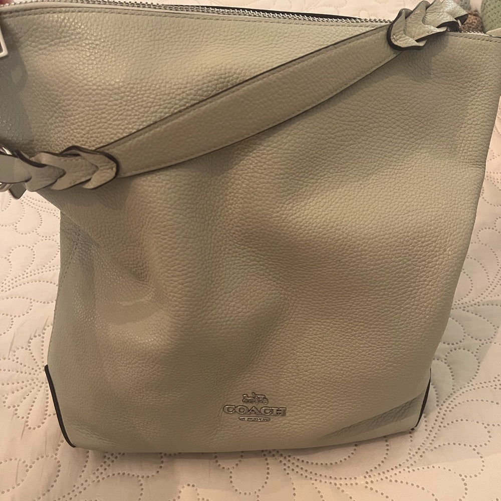 Authentic Coach purse. Sea foam green, pebbled leather.  Great condition.